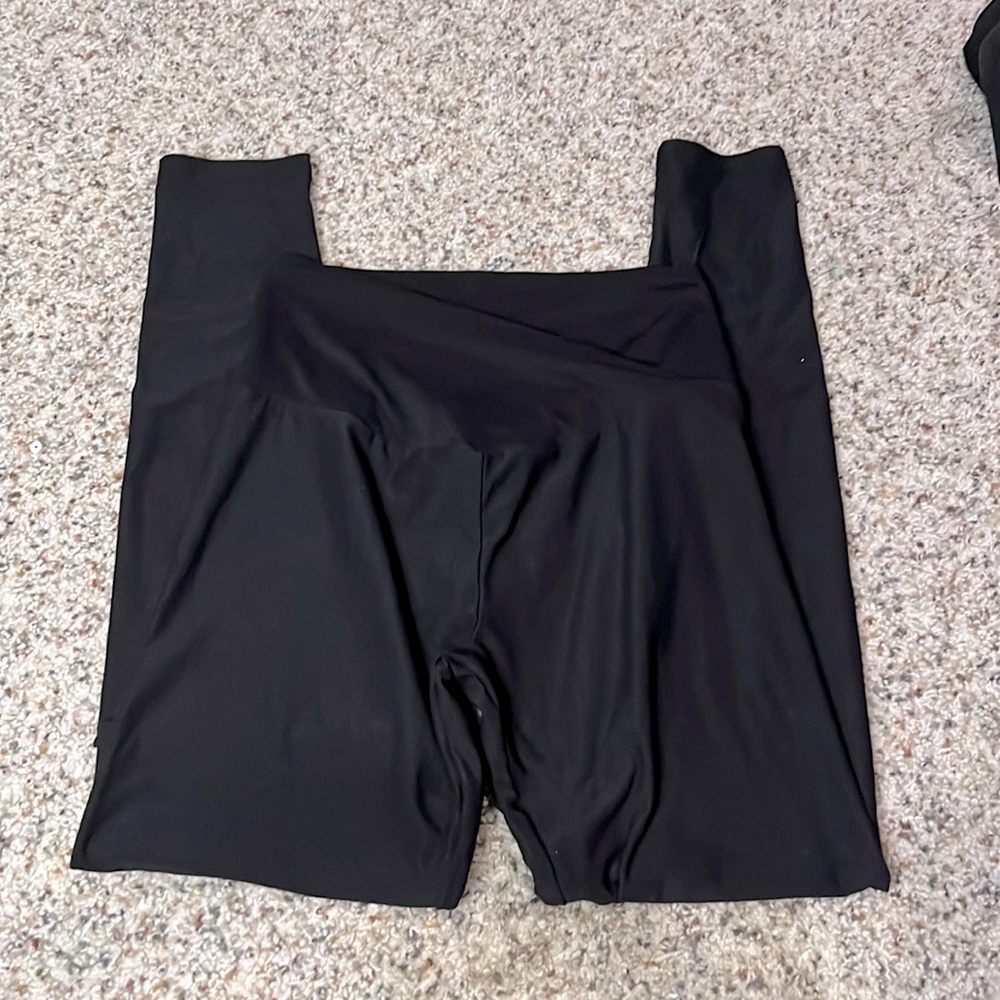 Black cross over leggings never worn too small for me.